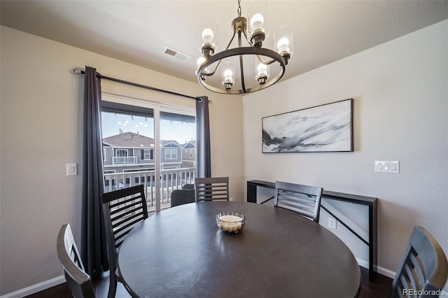 dining area with a chandelier