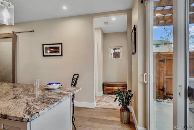 613 Iowa St, Golden, CO 80403 - interior space with recessed lighting, light wood-type flooring, visible vents, and baseboards