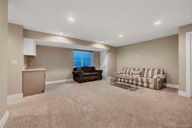 613 Iowa St, Golden, CO 80403 - living room featuring baseboards and light colored carpet