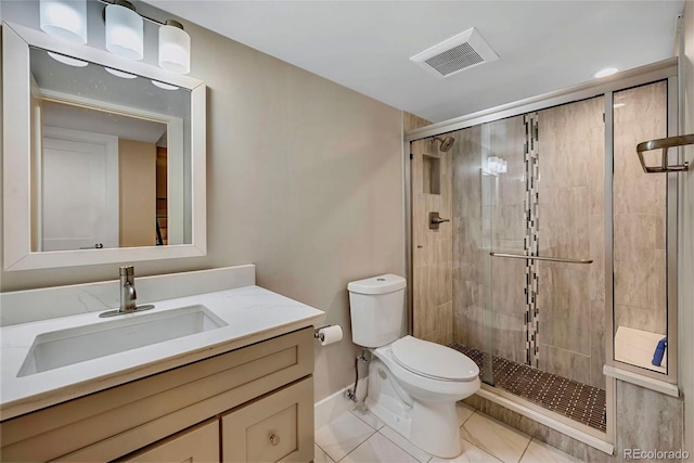 613 Iowa St, Golden, CO 80403 - bathroom with visible vents, toilet, a stall shower, and vanity