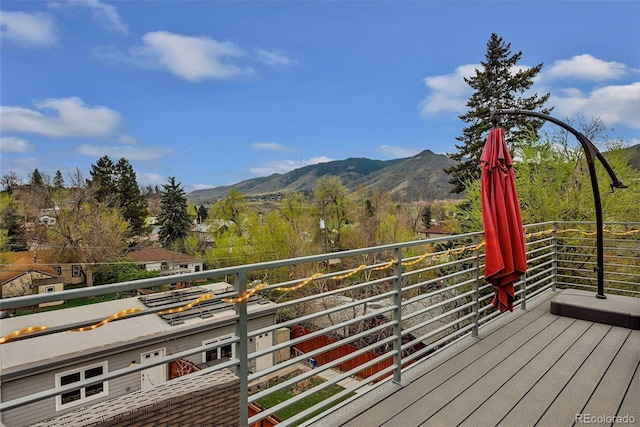 613 Iowa St, Golden, CO 80403 - wooden deck featuring a mountain view