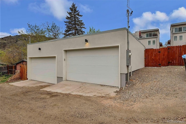 613 Iowa St, Golden, CO 80403 - detached garage featuring fence