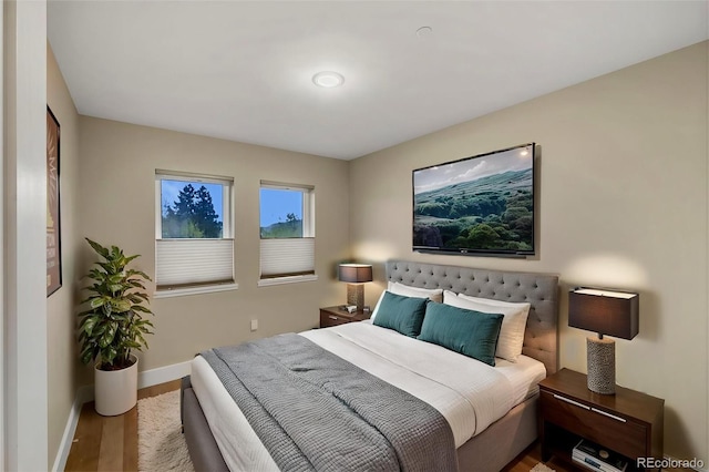 613 Iowa St, Golden, CO 80403 - bedroom featuring baseboards and wood finished floors
