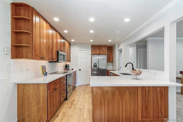 8474 E Otero Cir, Centennial, CO 80112 - kitchen featuring appliances with stainless steel finishes, a sink, recessed lighting, open shelves, and ornamental molding