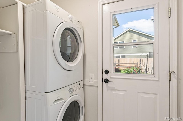 8474 E Otero Cir, Centennial, CO 80112 - laundry area with estacked washer and dryer and healthy amount of natural light
