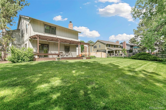 8474 E Otero Cir, Centennial, CO 80112 - back of property featuring a chimney and board and batten siding
