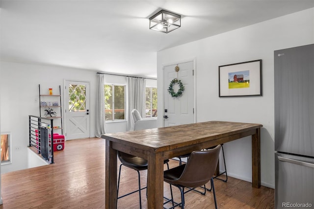 13693 W Utah Cir, Lakewood, CO 80228 - dining space with wood finished floors