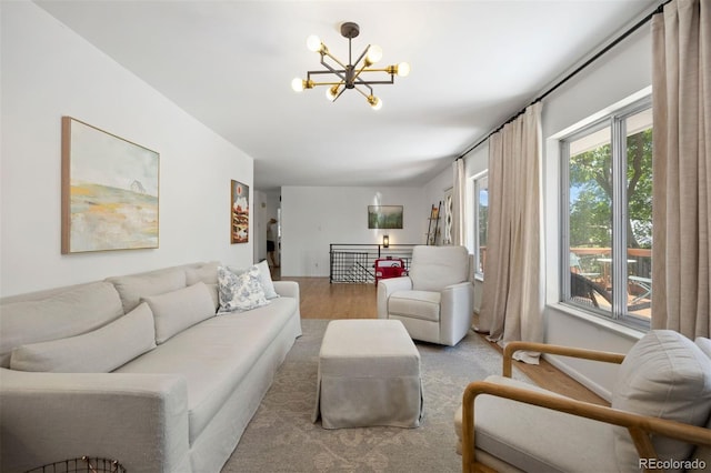 13693 W Utah Cir, Lakewood, CO 80228 - living area featuring a chandelier and wood finished floors
