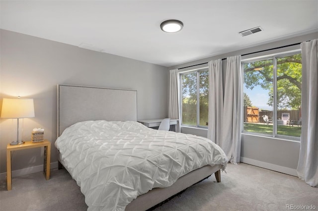 13693 W Utah Cir, Lakewood, CO 80228 - bedroom with baseboards and light colored carpet