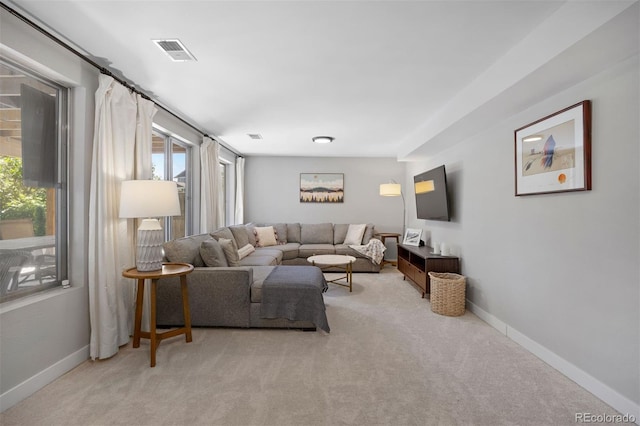 13693 W Utah Cir, Lakewood, CO 80228 - living area featuring light carpet and baseboards