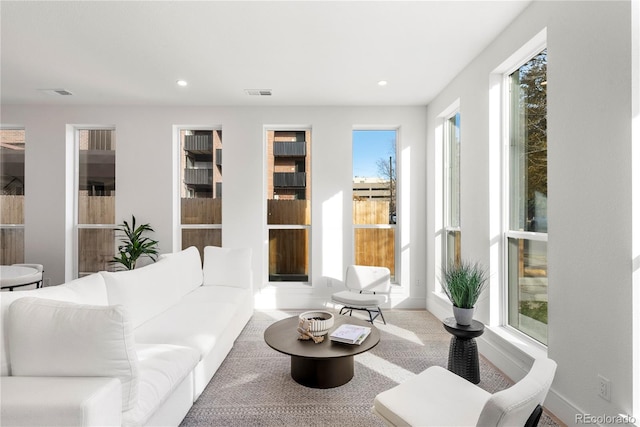 living room with plenty of natural light