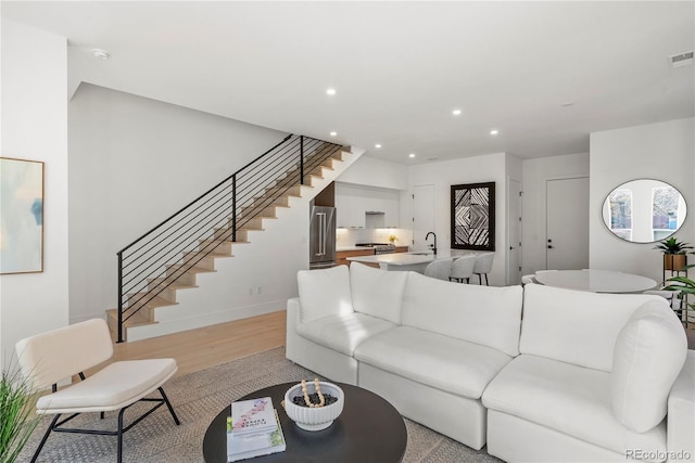 living room featuring light wood-type flooring