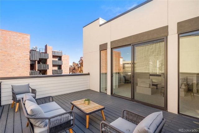 deck featuring outdoor lounge area