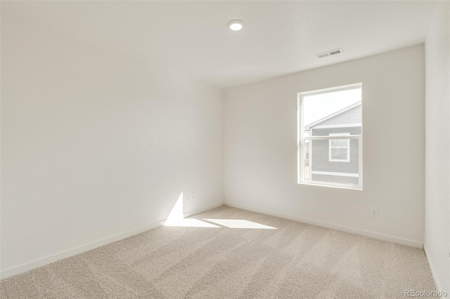 view of carpeted spare room