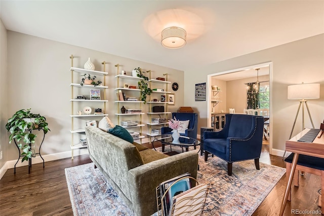 7708 S Krameria Ct, Centennial, CO 80112 - living area with dark wood-style flooring, baseboards, and a chandelier