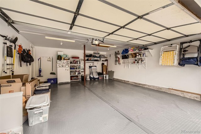 7708 S Krameria Ct, Centennial, CO 80112 - garage with freestanding refrigerator