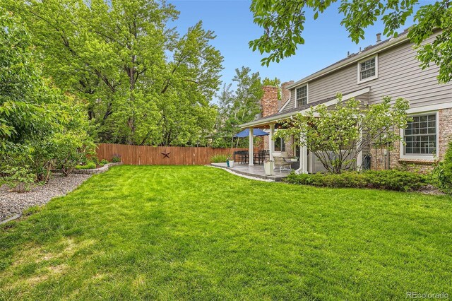 7708 S Krameria Ct, Centennial, CO 80112 - view of yard featuring a patio area