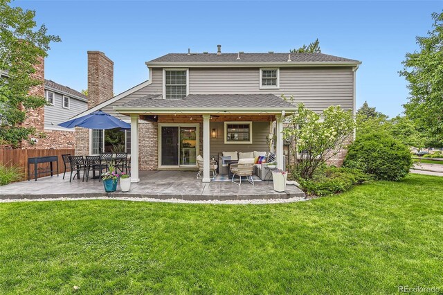 7708 S Krameria Ct, Centennial, CO 80112 - rear view of property featuring an outdoor hangout area and a patio