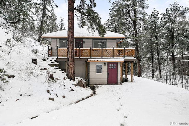 11710 Spruce Canyon Cir, Golden, CO 80403 - view of front of house with a deck
