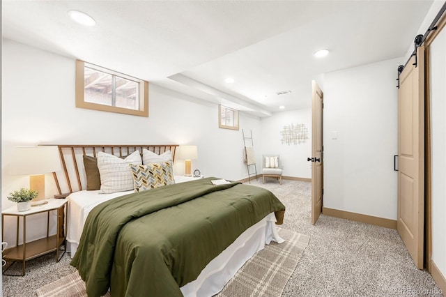 11710 Spruce Canyon Cir, Golden, CO 80403 - bedroom featuring a barn door, light carpet, recessed lighting, and baseboards