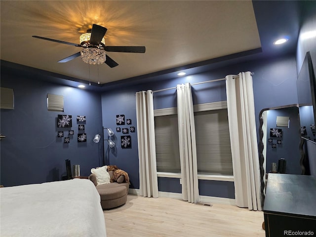bedroom with wood finished floors, baseboards, ceiling fan, and recessed lighting