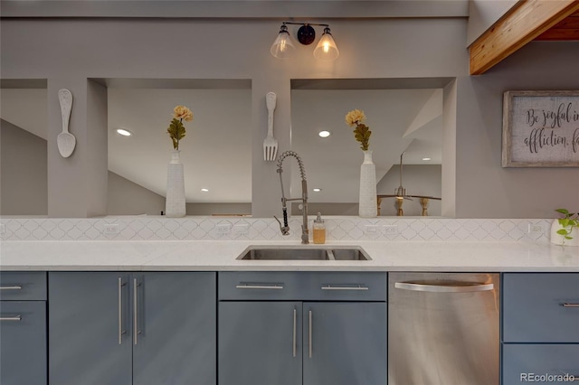 kitchen featuring sink, backsplash, light stone countertops, and dishwasher