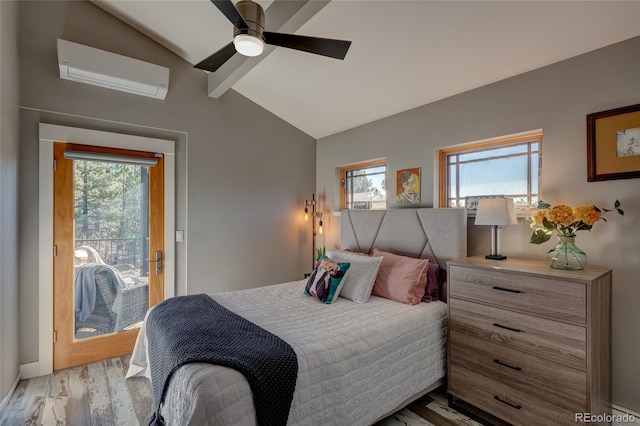 bedroom featuring vaulted ceiling, access to exterior, ceiling fan, light hardwood / wood-style floors, and a wall unit AC