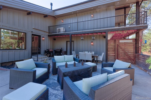 view of patio / terrace featuring a balcony and an outdoor hangout area