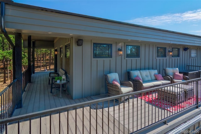 wooden deck with an outdoor hangout area