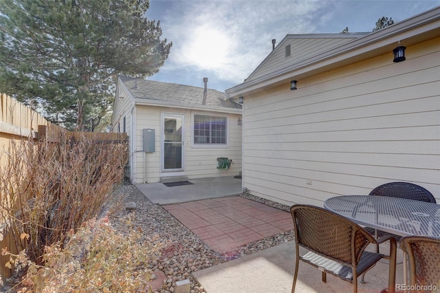 view of patio featuring fence