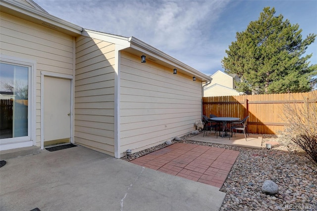 view of patio with fence