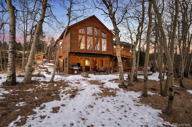 chalet / cabin featuring a garage