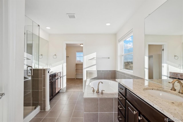 bathroom with vanity, recessed lighting, a shower stall, tile patterned floors, and a bath