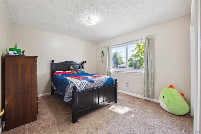 848 S 13th Ave, Brighton, CO 80601 - carpeted bedroom with a textured ceiling and baseboards
