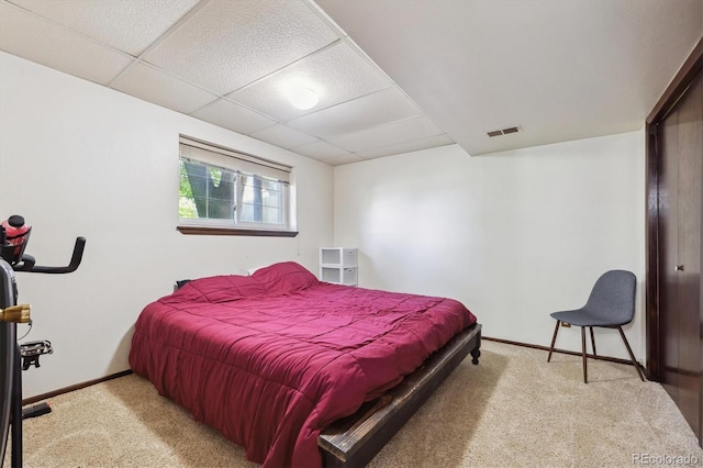 848 S 13th Ave, Brighton, CO 80601 - carpeted bedroom featuring baseboards and a drop ceiling