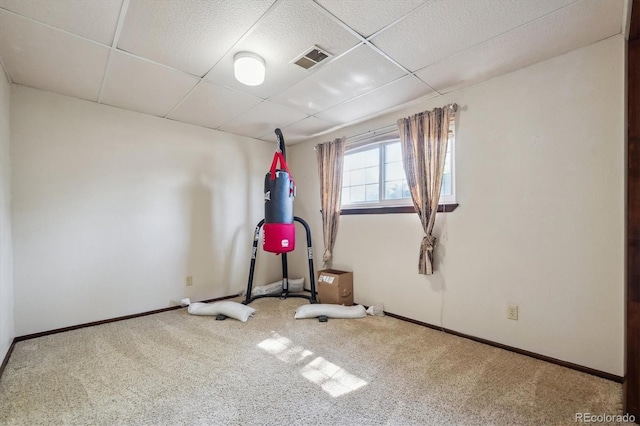848 S 13th Ave, Brighton, CO 80601 - exercise room featuring carpet, a paneled ceiling, and baseboards