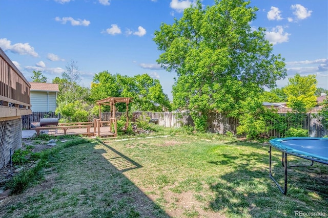 848 S 13th Ave, Brighton, CO 80601 - view of yard featuring a trampoline