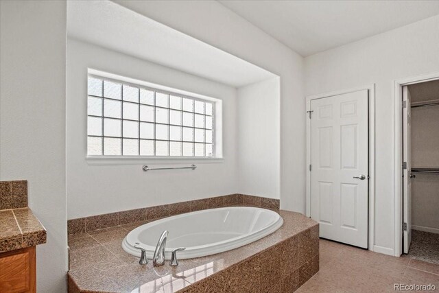 51 W 6th Pl, Byers, CO 80103 - bathroom featuring a garden tub