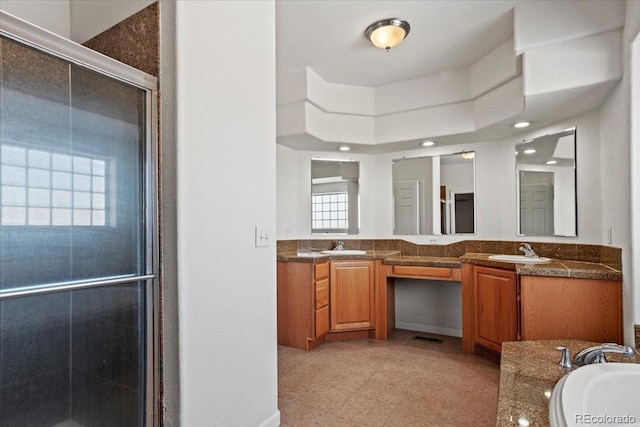 51 W 6th Pl, Byers, CO 80103 - bathroom featuring double vanity, a stall shower, a bath, and recessed lighting