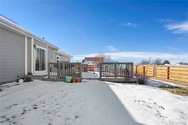 51 W 6th Pl, Byers, CO 80103 - snow covered patio featuring a deck