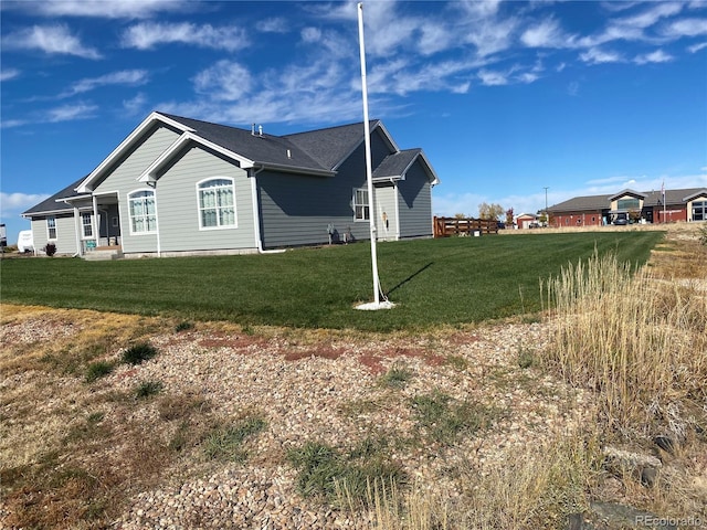 51 W 6th Pl, Byers, CO 80103 - view of property exterior with a yard