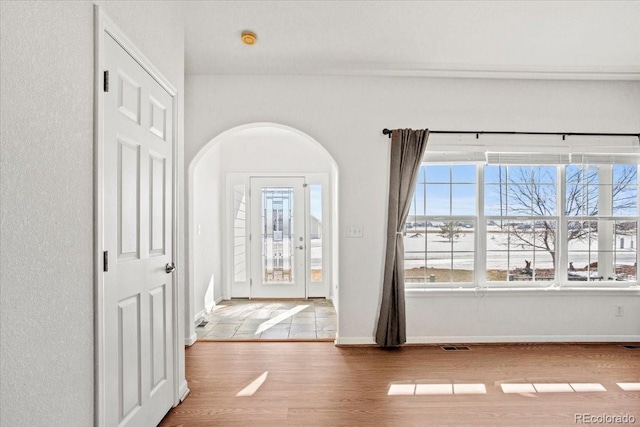 51 W 6th Pl, Byers, CO 80103 - foyer with wood finished floors and arched walkways