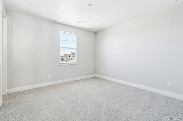 empty room with carpet floors