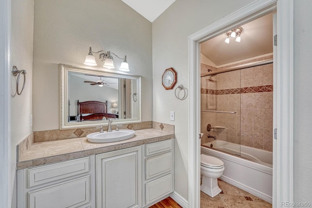 full bath with ensuite bathroom, toilet, bathtub / shower combination, and vanity