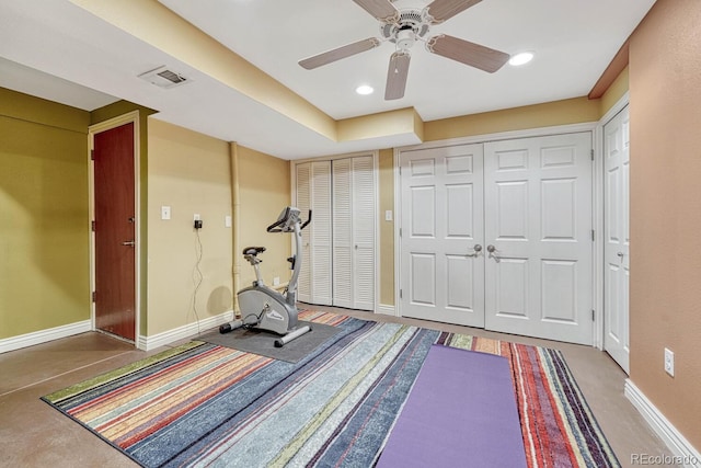 exercise room featuring recessed lighting, visible vents, and baseboards