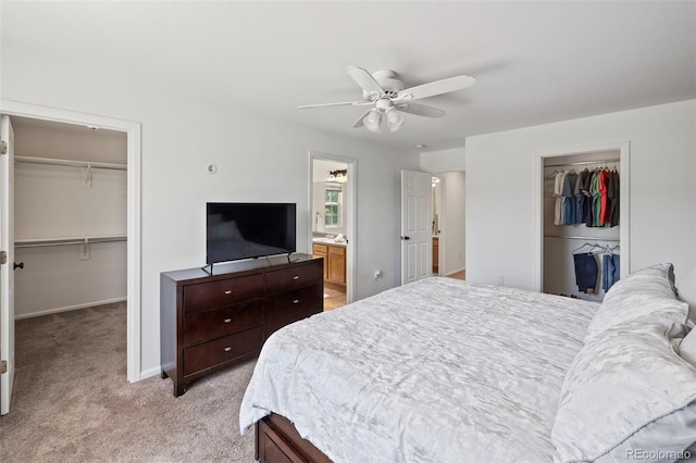 4807 S Killarney Ct, Aurora, CO 80015 - bedroom featuring a spacious closet, a closet, light colored carpet, and ceiling fan