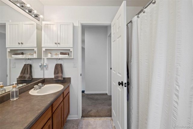 4807 S Killarney Ct, Aurora, CO 80015 - bathroom with vanity and baseboards