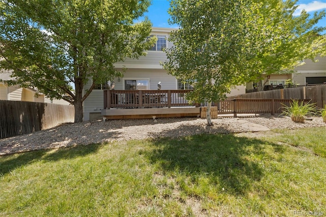 4807 S Killarney Ct, Aurora, CO 80015 - back of property with a wooden deck and a fenced backyard