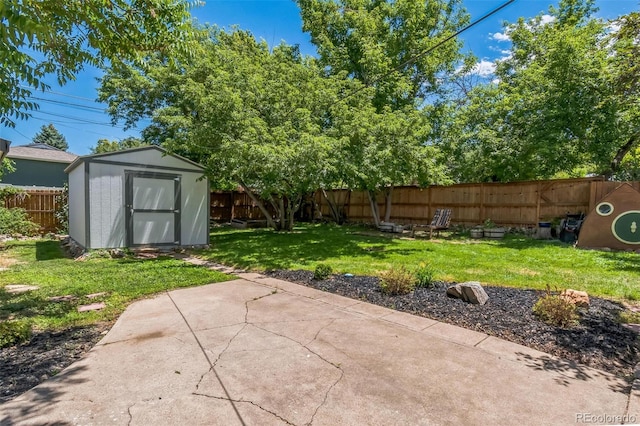 710 Raleigh St, Denver, CO 80204 - fenced backyard featuring a storage unit and a patio area