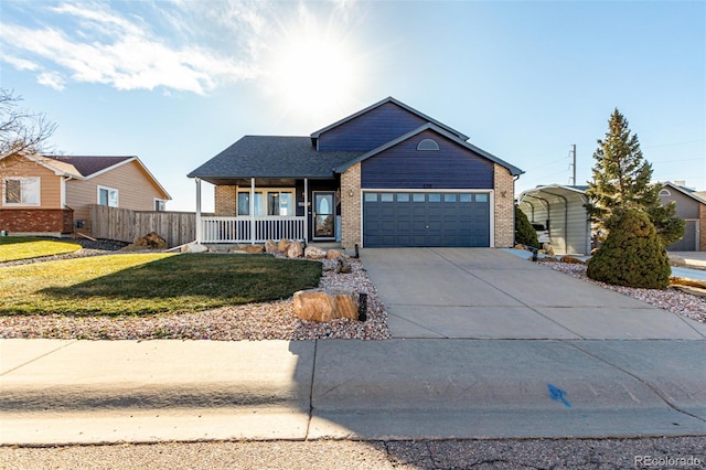 ranch-style house featuring covered porch, a garage, a carport, and a front yard